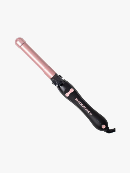 The Beachwaver Co. B1 Rotating Curling Iron black and pink curling rod on light gray background